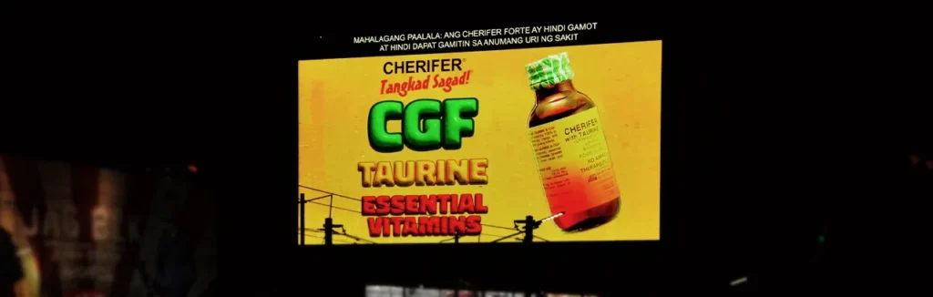 digital billboard ad featuring the Cherifer Forte CGF Taurine Essential Vitamins syrup bottle