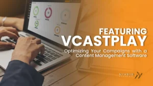 Person optimizing digital marketing campaigns with VCASTPLAY content management software on a laptop
